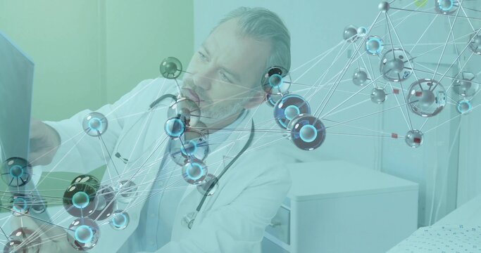 Leaning doctor in lab coat with stethoscope examining tablet in clinic with molecular overlay