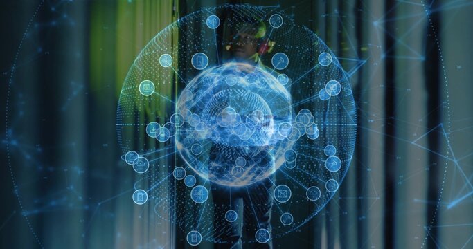 Standing mid adult man presenting holographic globe at demo, showing network nodes, suit and tie