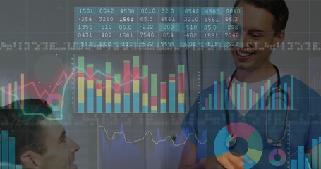 Smiling doctor wearing blue scrubs, stethoscope showing bar and line charts in clinic, copy space
