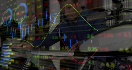 Leaning man in dark longsleeve shirt adjusting motorcycle tank in garage, with market data overlay