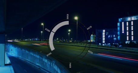 Showing multi-lane highway displaying red white light trails at overpass ramp, HUD overlay