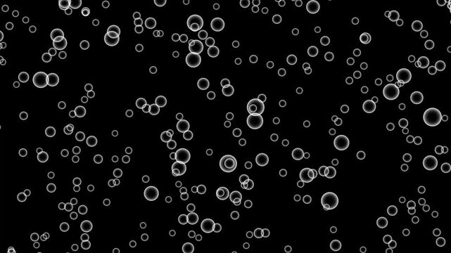 Water bubbles float upwards animation on black background. Soap bubbles floating. Real blowing water bubble. Slow motion of air bubbles are flying on dark surface. Bubbles floating gently in the air.