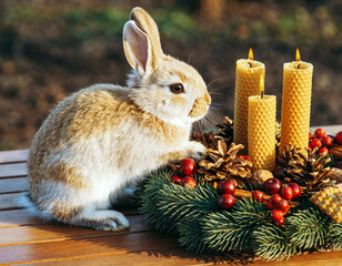Rabbit beside a garland centerpiece surrounded by pinecones and beeswax candles. Ai