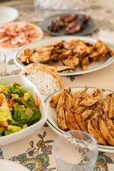 Vertical View of Family Dinner Table – Seafood, Fish and Homemade Dishes