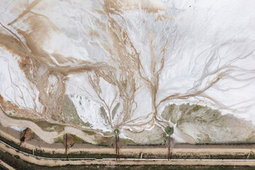 Aerial drone view of tailings pond near a cement factory near to Devnya, Varna, Bulgaria. Industrial scene of environmental impact