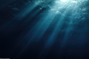 Sunbeams pierce blue depths