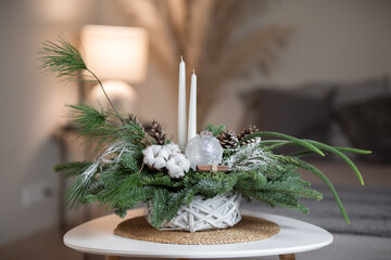 Winter Holiday Centerpiece With Pine Branches, Candles and Natural Decor