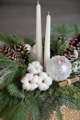 Winter Holiday Centerpiece With Pine Branches, Candles and Natural Decor