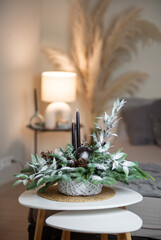 Winter Holiday Centerpiece With Pine Branches, Candles and Natural Decor