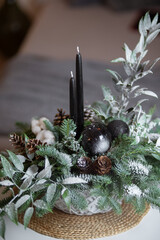 Winter Holiday Centerpiece With Pine Branches, Candles and Natural Decor