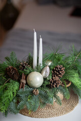 Winter Holiday Centerpiece With Pine Branches, Candles and Natural Decor
