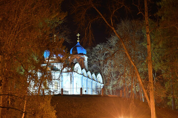 landscape from the park in autumn, evening in the city park, orthodox church in the background,...