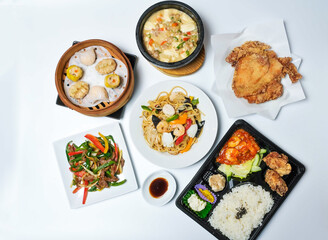 A vibrant and delicious assortment of Chinese dishes, ready to be enjoyed. Perfect for illustrating takeout menus and showcasing culinary excellence.
