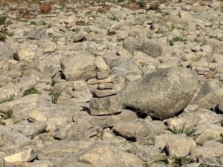 rock art on dry river bed background texture