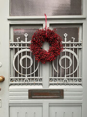 Red Christmas wreath on the door