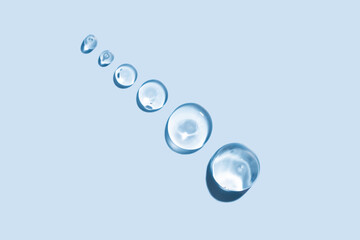 Close-up image displaying a pink pure gel drops texture with glossy highlights and clear droplets, ideal for background use