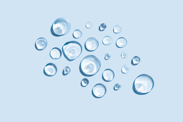 Glycerin gel texture. Transparent serum smears on blue background. Liquid gel moisturizer with bubbles macro