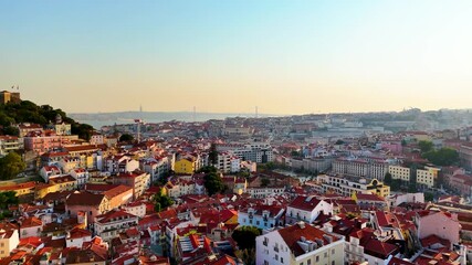 Golden Hour Over Lisbon – Cinematic Drone Pan Above Colorful Rooftops, Red Palms. Portugal Aerial 