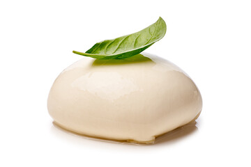 Creamy cheese and herb garnish, Creamy fresh burrata paired with fragrant basil on smooth surface