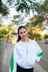 Young Asian Woman in Sporty Casual Outfit Outdoors
