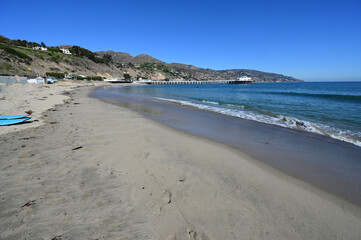 Malibu beach with Malibu Pier in the background. 