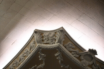 ornate ceiling detail, alberto maranhão theater natal brazil, baroque architecture historic theater interior, decorative plasterwork and vault, classical art architectural corner with spotlight © liligluck