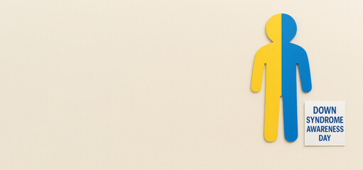 Down syndrome awareness day concept with paper cutout in yellow and blue colors