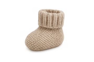 Knitted baby bootie keeping small feet warm, transparent background