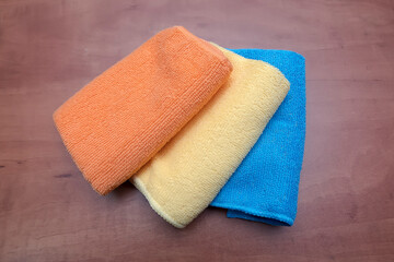 Three rags of different colors