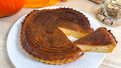 Richly swirled pumpkin pie teases autumnal indulgence, perfect for Thanksgiving feasts and cozy Samhain gatherings