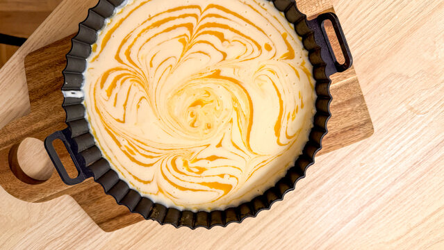Swirling saffron cheesecake magic, perfect for Nowruz celebrations, blends culinary whimsy and celestial artisan flavors