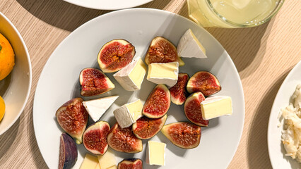 Indulge in decadent fig and brie medley, a gustatory delight celebrating Mediterranean Harvest Festival and Fromage Fetish Day
