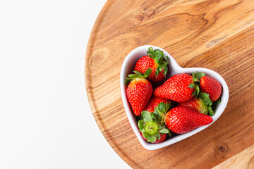 Strawberries in heart bowl