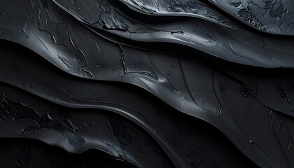 Dark textured surface with layered embossed details, minimal elegant visual