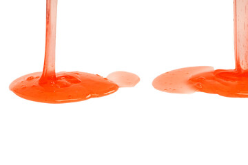 Red slime toy isolated on a white background.
