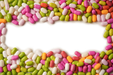 Sweet multicolored candies isolated on white background.