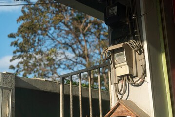 Electrical Meter on Wall with Nature Background