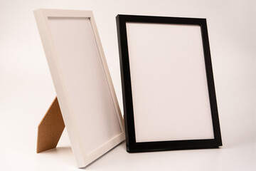Black and white empty photo frame isolated on white background.