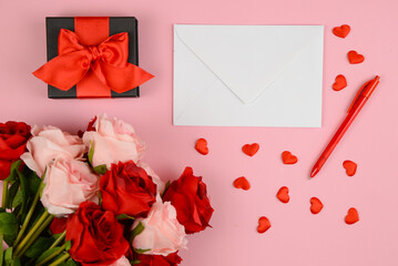 Envelope with red hearts on pink background.Valentine's day concept.
