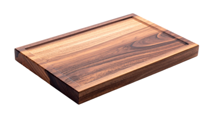 Angled close-up of a rectangular wooden cutting board with juice groove and dark grain