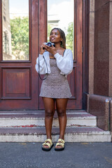 Young woman with vintage camera in hand
