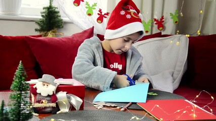 Cute boy preparing for Christmas cutting out paper decorations and garlands. Winter holidays. Christmas concept.
- Powered by Adobe