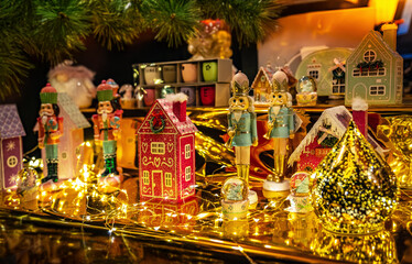 Cozy Christmas Fair. The Christmas market showcase, decorated with warm lights and festive decorations, conveys the festive spirit of the season. Christmas and New Year's toys. The spirit of Winter