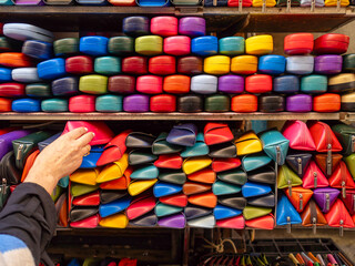 A large selection of colorful spectacle cases. The cases have different closure types.