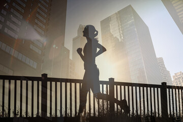 Double Exposure Runner in Urban Cityscape at Sunrise – Fitness, Motivation, and Active Lifestyle Concept
