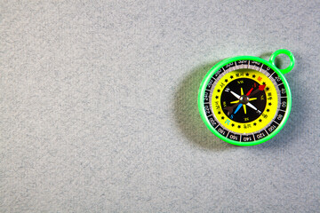 compass in the form of a toy on a black background.