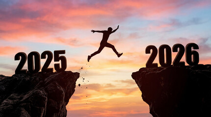 Silhouette of person jumping from 2025 to 2026 across cliff gap at sunset symbolizing new year transition and personal growth.