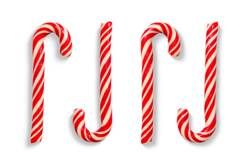 Obraz premium Set of red and white candy canes isolated on a transparent background, PNG. High resolution. Traditional Christmas sweets for holiday decoration and winter decoration design.