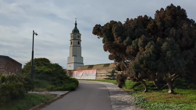 Sahat kula (Tower Clock) in background, Kalemegdan, pathway. Belgrade, Serbia.