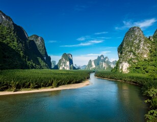 serene landscape of a river winding through towering karst mountains under a bright blue sky with